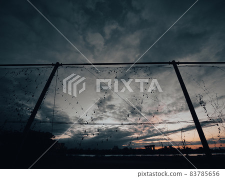 Dusk sky and net 83785656