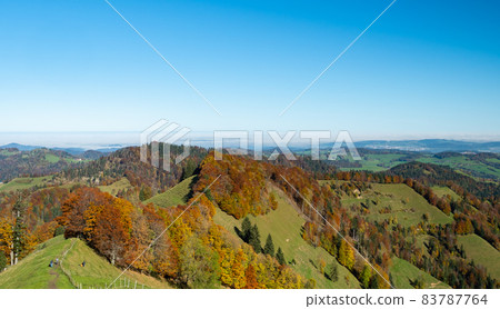 Amazing view from Schnebelhorn, a hill in Cantone Zurich, over colorful autumnal forests 83787764