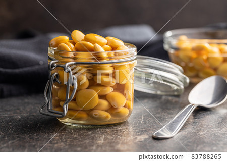 Pickled yellow Lupin Beans in jar. Pickled yellow Lupin Beans in jar. 83788265