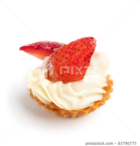 Mini tartlets with cheese and strawberry on a white Cooking concept. Healthy delicious dessert Mini tartlets with cheese and strawberry on a white Cooking concept. Healthy delicious dessert 83790775