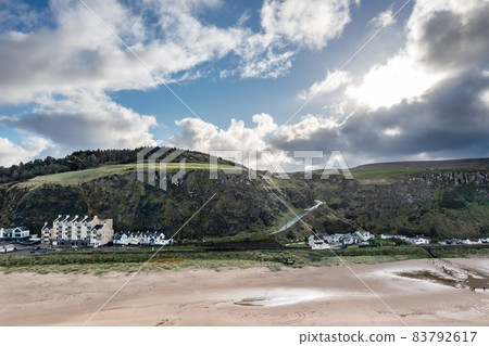 Aerial view of Downhill beach at County Antrim coastline - Northern Ireland 83792617