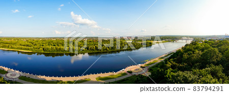 Panorama of a beautiful river and city promenade. Panoramic view of the city river. Banner for advertising urban tourism Panorama of a beautiful river and city promenade. Panoramic view of the city river. Banner for advertising urban tourism 83794291