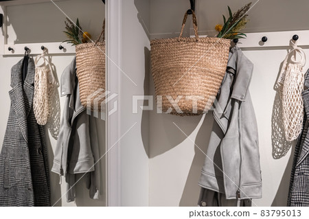 Place for outerwear in the hallway, home interior. Place for outerwear in the hallway, home interior. 83795013