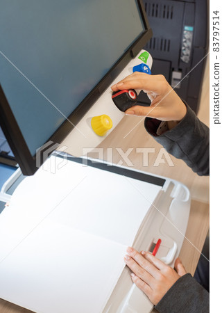 A visually impaired woman uses special reading equipment A visually impaired woman uses special reading equipment 83797514