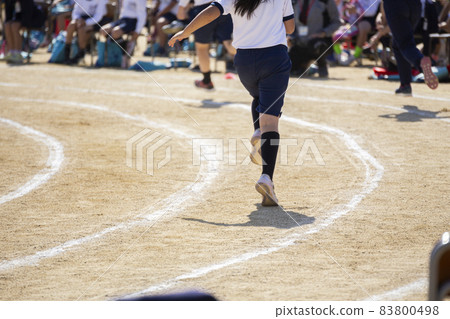 Elementary school student running at athletic meet Elementary school student running at athletic meet 83800498
