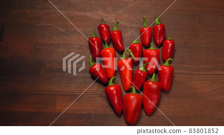Chili red hot pepper on the table. Chili red hot pepper on the table. 83801852