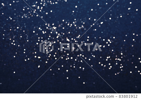 Festive Blue background of silver glitter lights. Winter blurred abstraction Festive Blue background of silver glitter lights. Winter blurred abstraction 83801912