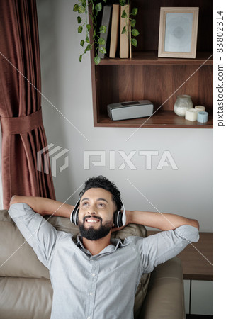 Positive Man Listening to Music Positive Man Listening to Music 83802314
