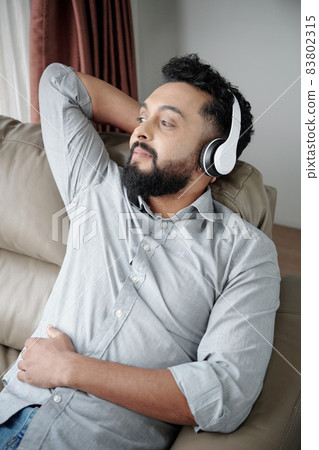 Man Enjoying Good Music Man Enjoying Good Music 83802315