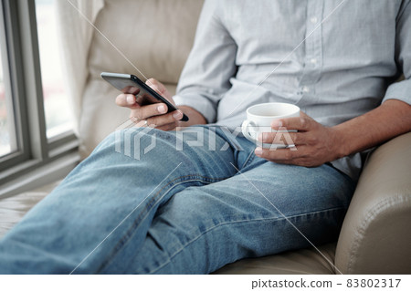 Man Checking Social Media Online Man Checking Social Media Online 83802317