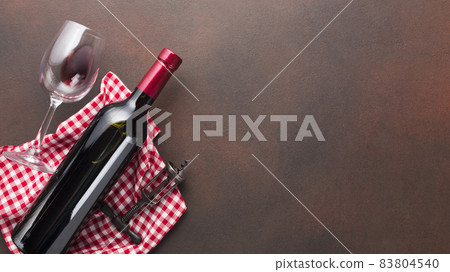vintage background with red bottle wine. High quality beautiful photo concept vintage background with red bottle wine. High quality beautiful photo concept 83804540