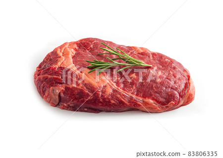 Raw rib eye steak of beef with rosemary isolated on white background 83806335