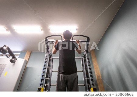Men training in the gym (back) 83806662
