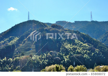 Scenery with a steel tower on the mountaintop Scenery with a steel tower on the mountaintop 83808072