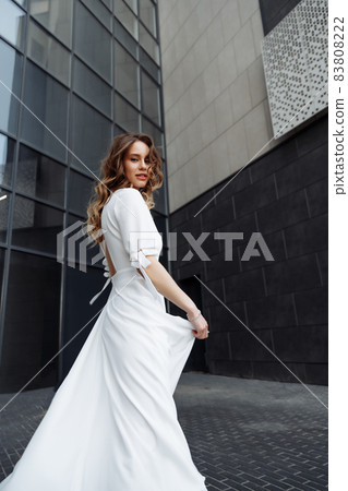 Portrait of the bride. Beautiful wedding dress. 83808222