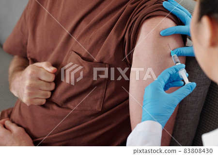 Man Getting Vaccine Against Coronavirus Man Getting Vaccine Against Coronavirus 83808430