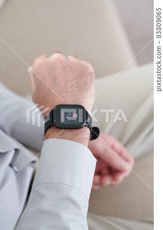 Mature Man Checking Heart Rate Mature Man Checking Heart Rate 83809065