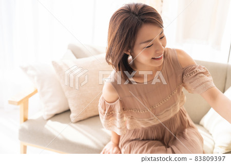 Young woman relaxing 83809397
