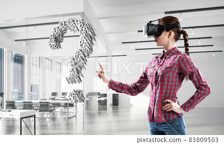 Girl in virtual reality mask experiencing virtual technology world. Mixed media Girl in virtual reality mask experiencing virtual technology world. Mixed media 83809503