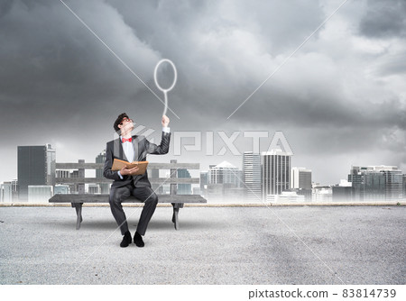 Young student with a book 83814739