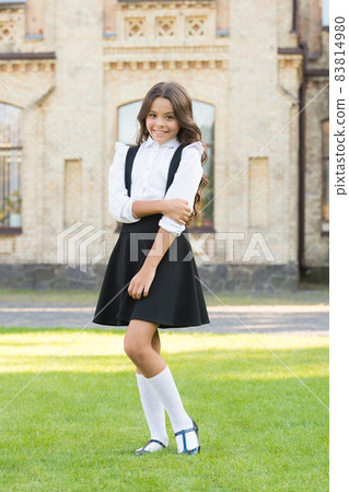 Happy childrens day. Elegant look of schoolgirl. Kid 83814980