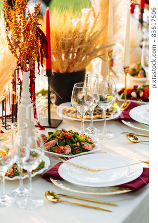 Oriental outdoor banquet served festive table 83817506