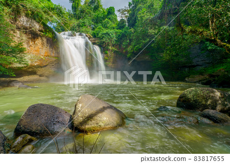 Beautiful waterfall with sunlight in jungle, Haew Suwat Waterfall at khao yai Nakhonratchasima province Beautiful waterfall with sunlight in jungle, Haew Suwat Waterfall at khao yai Nakhonratchasima province 83817655