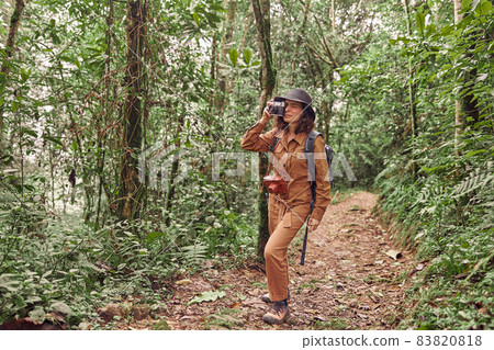 Beautiful young female caucasian tourist in equatorial africa jungles Beautiful young female caucasian tourist in equatorial africa jungles 83820818