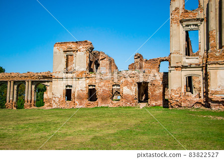 The ruins of a medieval castle in Ruzhany. View of the ruined old palace complex with columns. Brest region, Belarus. The ruins of a medieval castle in Ruzhany. View of the ruined old palace complex with columns. Brest region, Belarus. 83822527