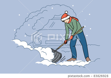 Man shovel dig out car on snowy winter day Man shovel dig out car on snowy winter day 83826928