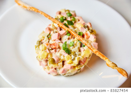 Russian New Year's dish. Olivier salad 83827454