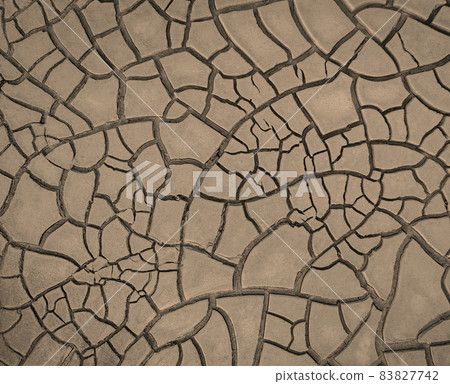 Cracked brown mud, texture of barren land 83827742