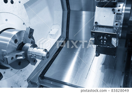 The CNC lathe machine forming cutting at the metal shape parts. The CNC lathe machine forming cutting at the metal shape parts. 83828049