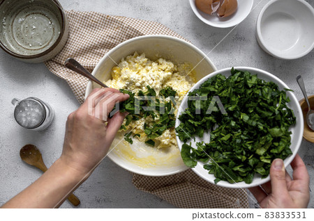 Cooking spinach quiche healthy homemade tart with spinach and cheese. Step by step recipe. 83833531