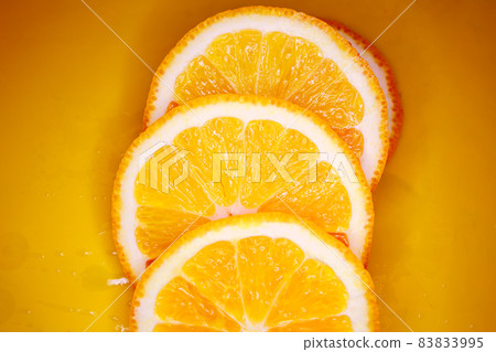 Sliced orange background 83833995
