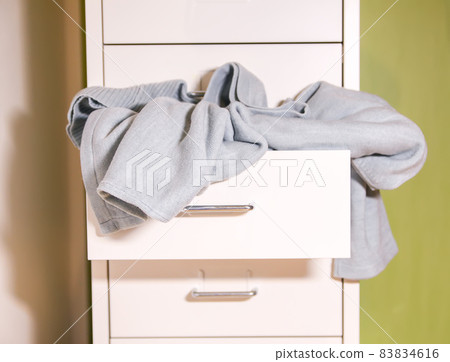 Home wardrobe with different clothes 83834616