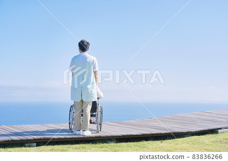 Caregiver outdoors 83836266