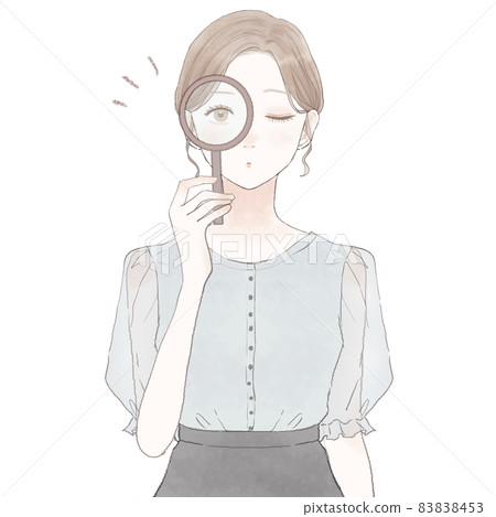 A woman checking with a loupe 83838453