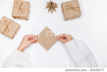 Christmas tree origami paper craft. The child performs the Step-by-step instruction. Step11 of 23 . DIY concept 83838577