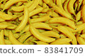 Abstract background with fresh ripe yellow bananas. Close-up. 83841709