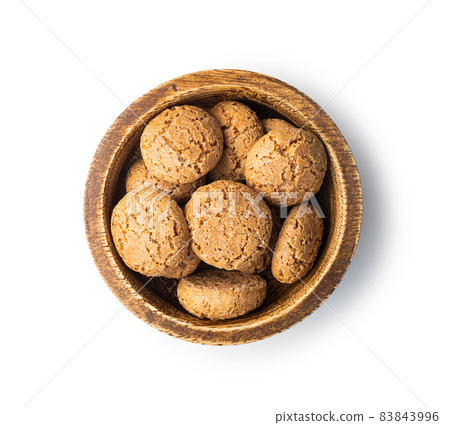 Amaretti biscuits in bowl. Sweet italian almond cookies. Amaretti biscuits in bowl. Sweet italian almond cookies. 83843996