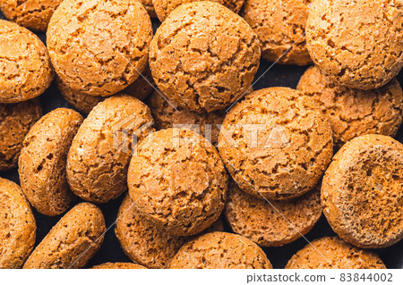 Amaretti biscuits. Sweet italian almond cookies. 83844002