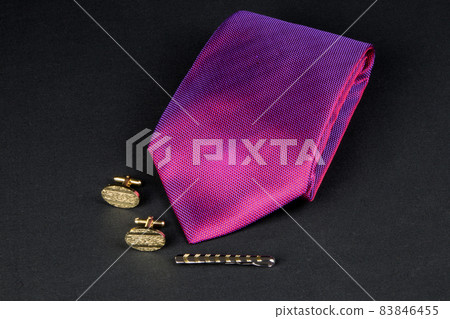 Cuff Links with Silk Tie and Tie Pin on a Baize Surface Cuff Links with Silk Tie and Tie Pin on a Baize Surface 83846455