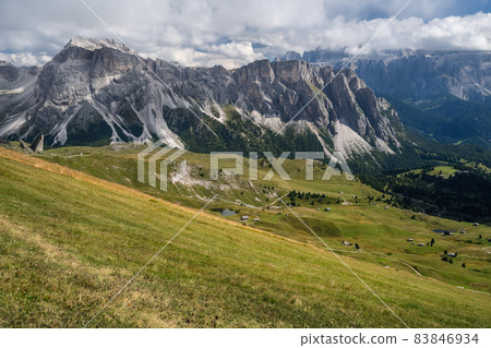 Hiking path and epic landscape of Seceda peak in Dolomites Alps, Odle mountain range, South Tyrol, Italy, Europe Hiking path and epic landscape of Seceda peak in Dolomites Alps, Odle mountain range, South Tyrol, Italy, Europe 83846934