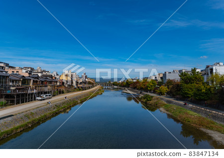 A view of the Kamo River in Kyoto on a sunny day A view of the Kamo River in Kyoto on a sunny day 83847134