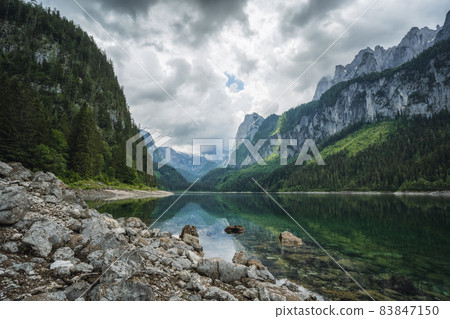 Dachstein Mountains reflected in Gosau beautiful lake, Austria Dachstein Mountains reflected in Gosau beautiful lake, Austria 83847150