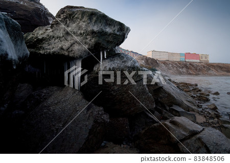 Ice-covered rocks on the banks of the Anadyr estuary. 83848506