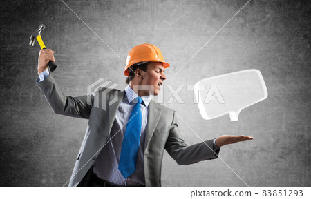 Furious businessman going to crash speech bubble Furious businessman going to crash speech bubble 83851293