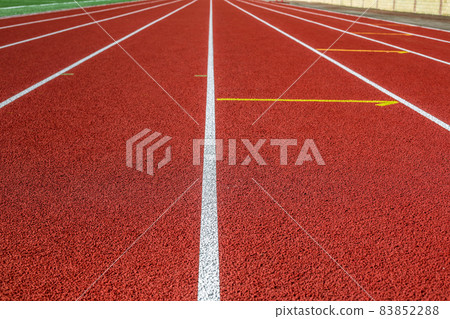 Red treadmill in sport field. 83852288