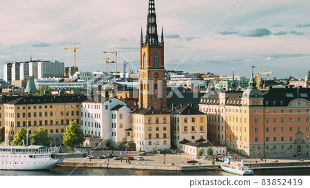 Stockholm, Sweden. Gamla Stan Is Famous Popular Place And Destination Scenic. Riddarholm Church In Sunny Summer Cityscape Skyline. Scenic View Of Embankment In Old Town. UNESCO World Heritage Site. Stockholm, Sweden. Gamla Stan Is Famous Popular Place And Destination Scenic. Riddarholm Church In Sunny Summer Cityscape Skyline. Scenic View Of Embankment In Old Town. UNESCO World Heritage Site. 83852419